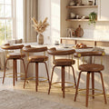 TYBOATLE Swivel Bar Stools Set of 2, Counter Height Bar Stools with Bent Wood Legs and Back, Mid-Century Modern Faux Leather Bar Chairs Island Barstools for Kitchen (4, Brown)